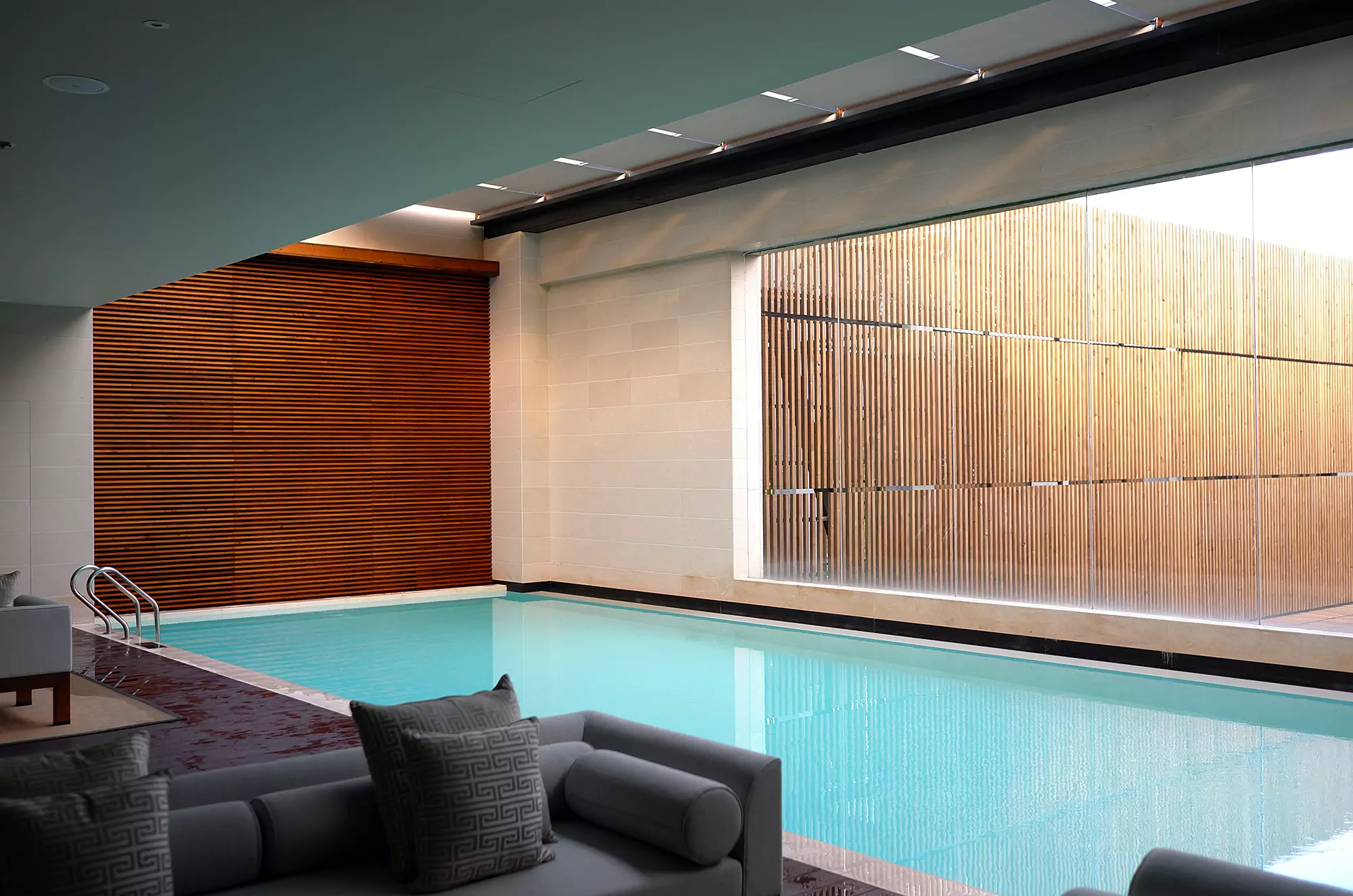 Indoor Pool With Luxury Sofas For Seating