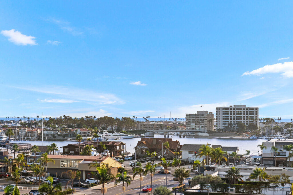 Scenic view over Newport Beach businesses leading to the sparkling waters of the Pacific Ocean