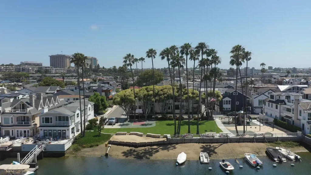 Scenic view of Newport Island Park with families enjoying the amenities