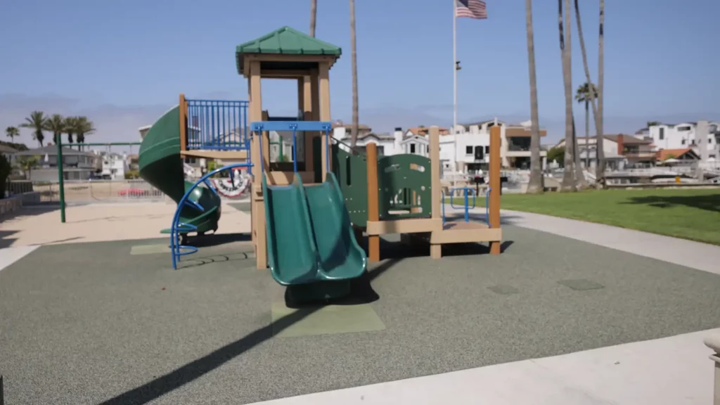 Playground area with children playing at Newport Island Park