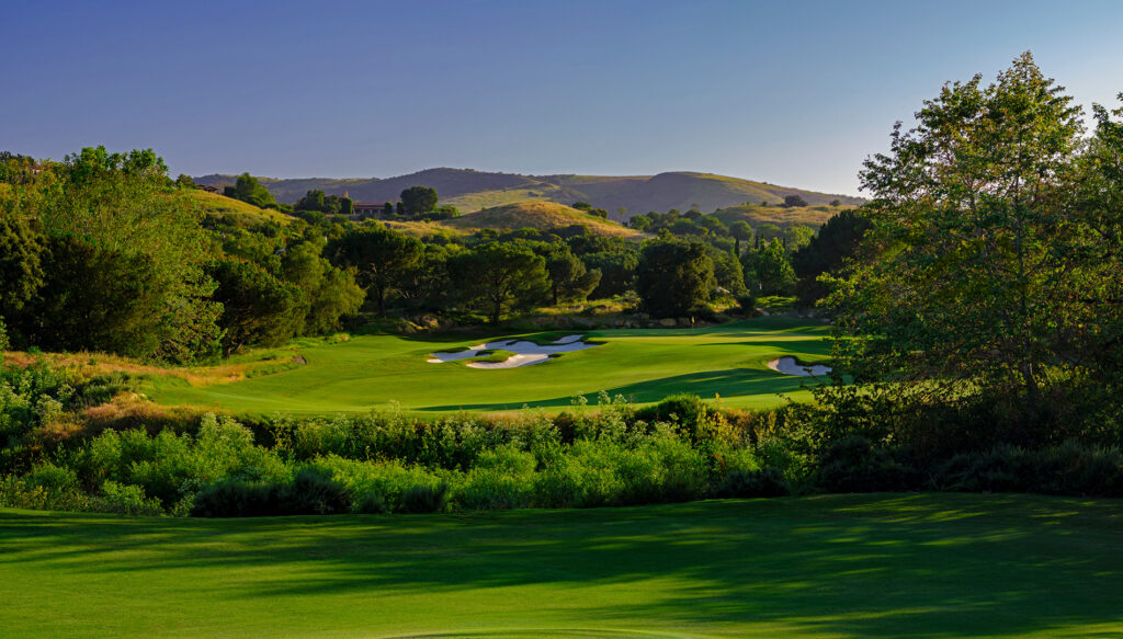 Shady Canyon Golf Club's pristine fairways nestled in a serene landscape