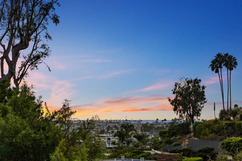 Ocean and sunset views over Corona del Mar make your home worth even more