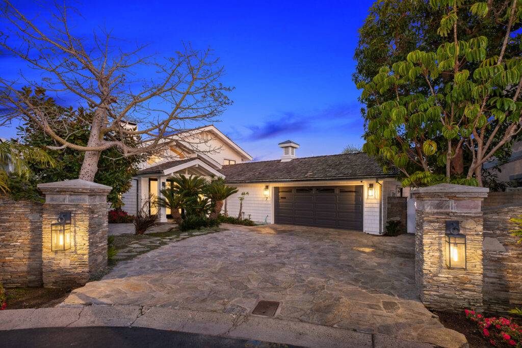 Luxury home driveway and front facade in Newport Beach top realtors
