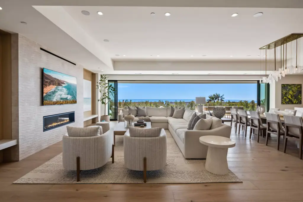 A luxury home interior living room like this open floor plan will help to sell your home in Corona del Mar