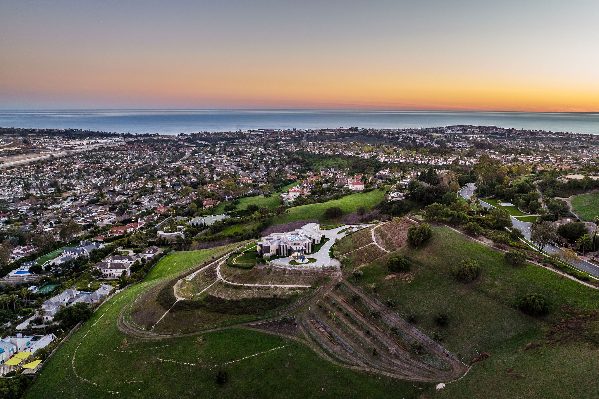 Aerial view of Orange County luxury property sold by the Stavros Group top realtor agents with Douglas Elliman real estate
