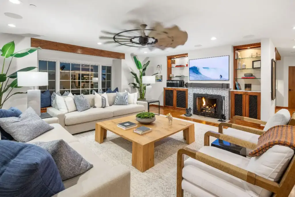 Living room of luxury property in Orange County with security system for wealthy homeowners