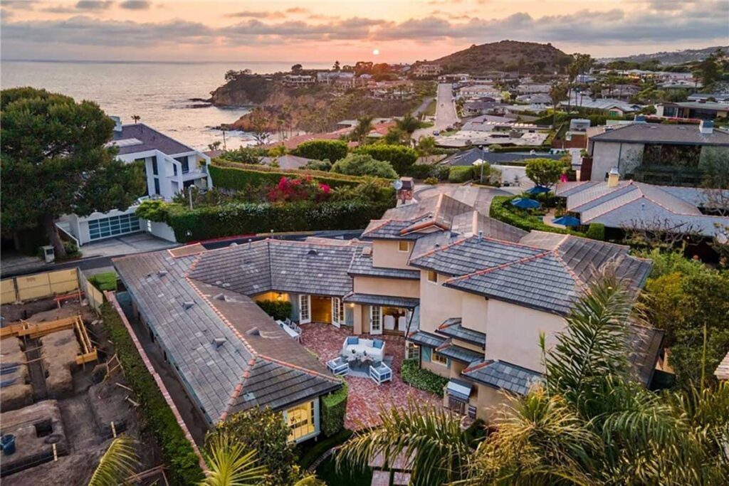 Aerial view of the Laguna Beach property with the ocean in the background, example for home sellers in Orange County with top local realtor agents