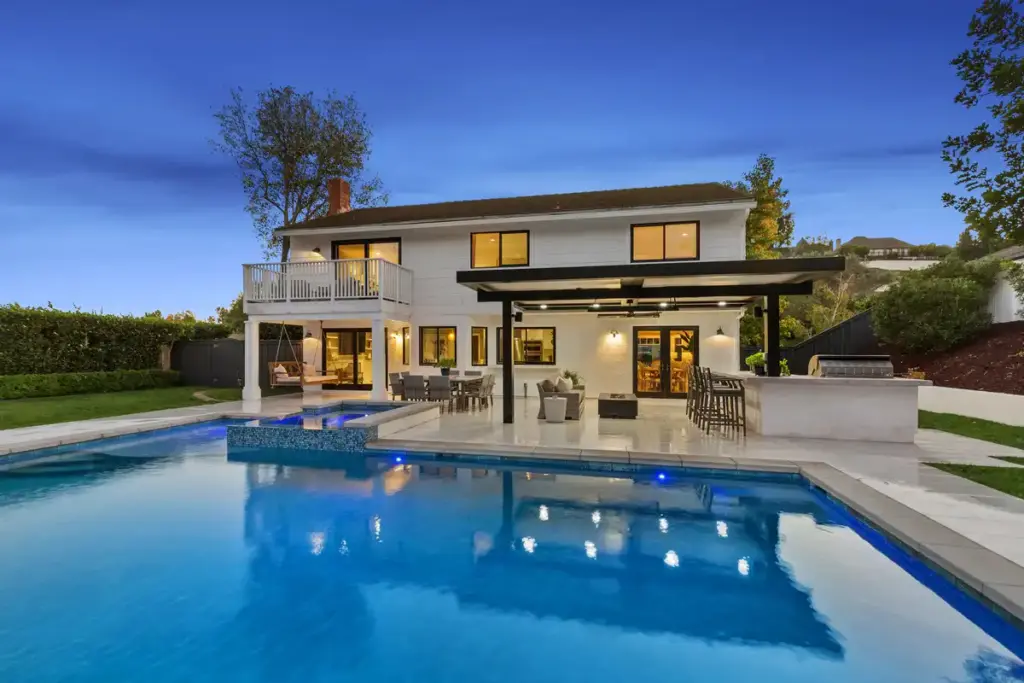 Luxury home with backyard pool at a property sold by Andy Stavros Group, the best Orange County luxury realtors to invest in a home for your adult children